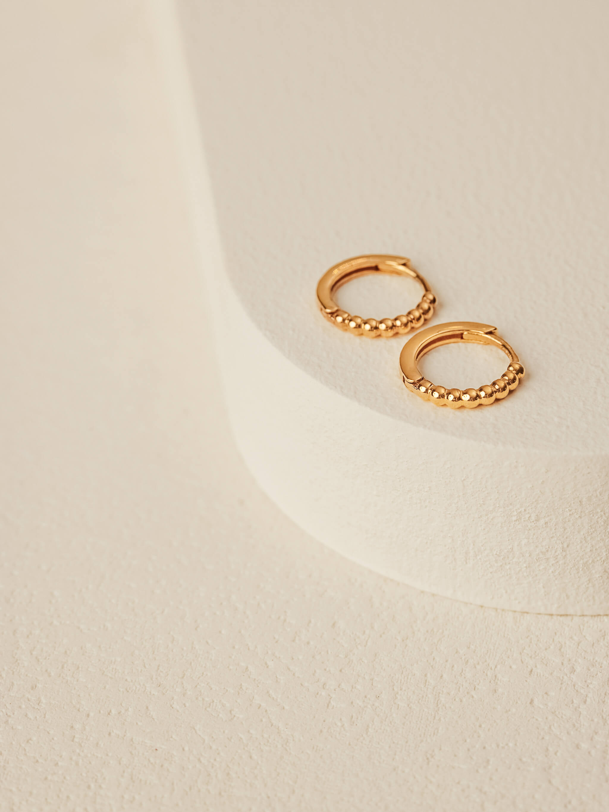 Beaded Huggie Earrings in gold vermeil