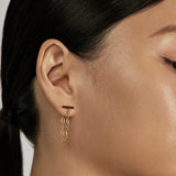 Classic Bar Stud Earrings styled in a layered ear stack
