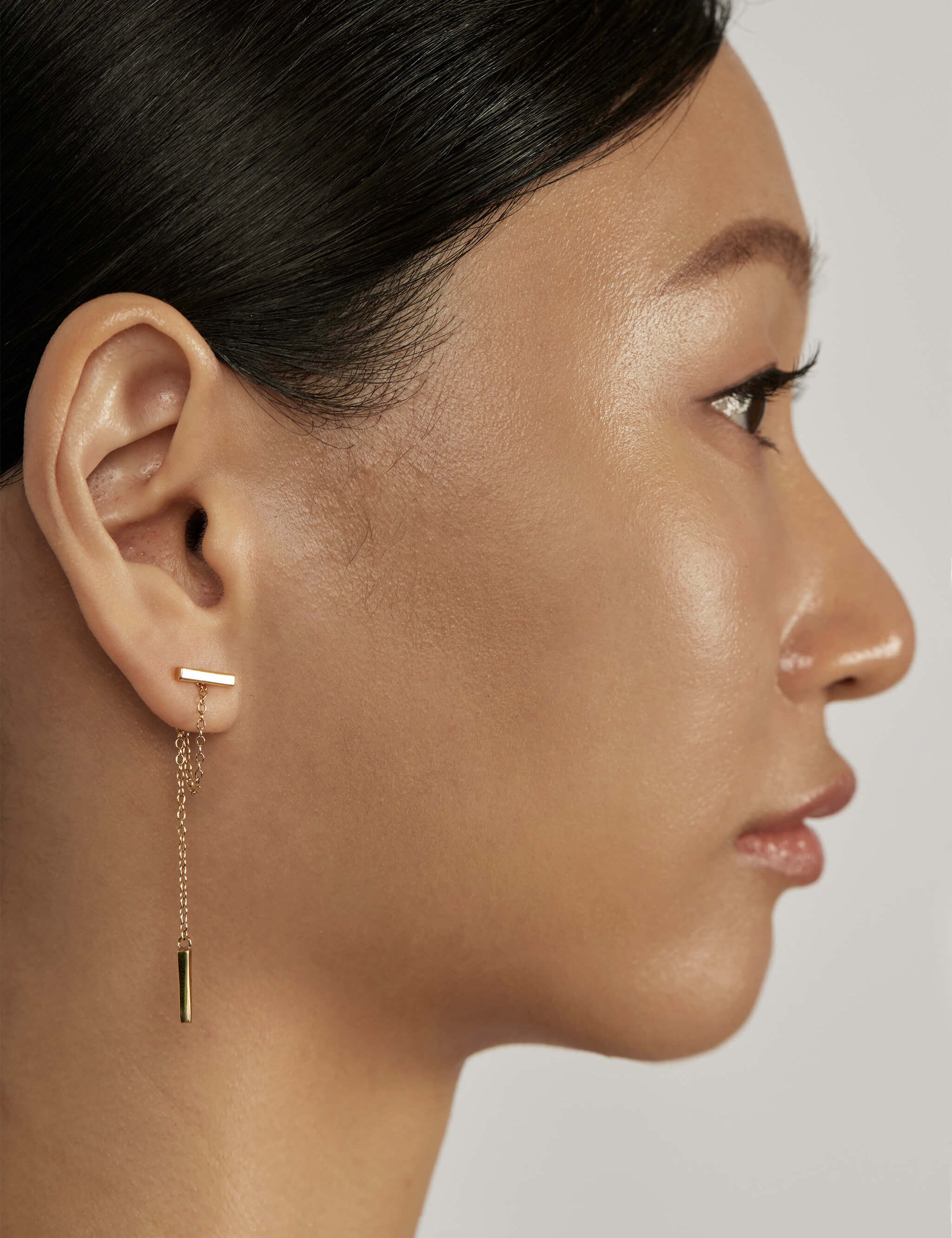 Classic Chain Ear Jacket Earrings styled in a layered ear stack