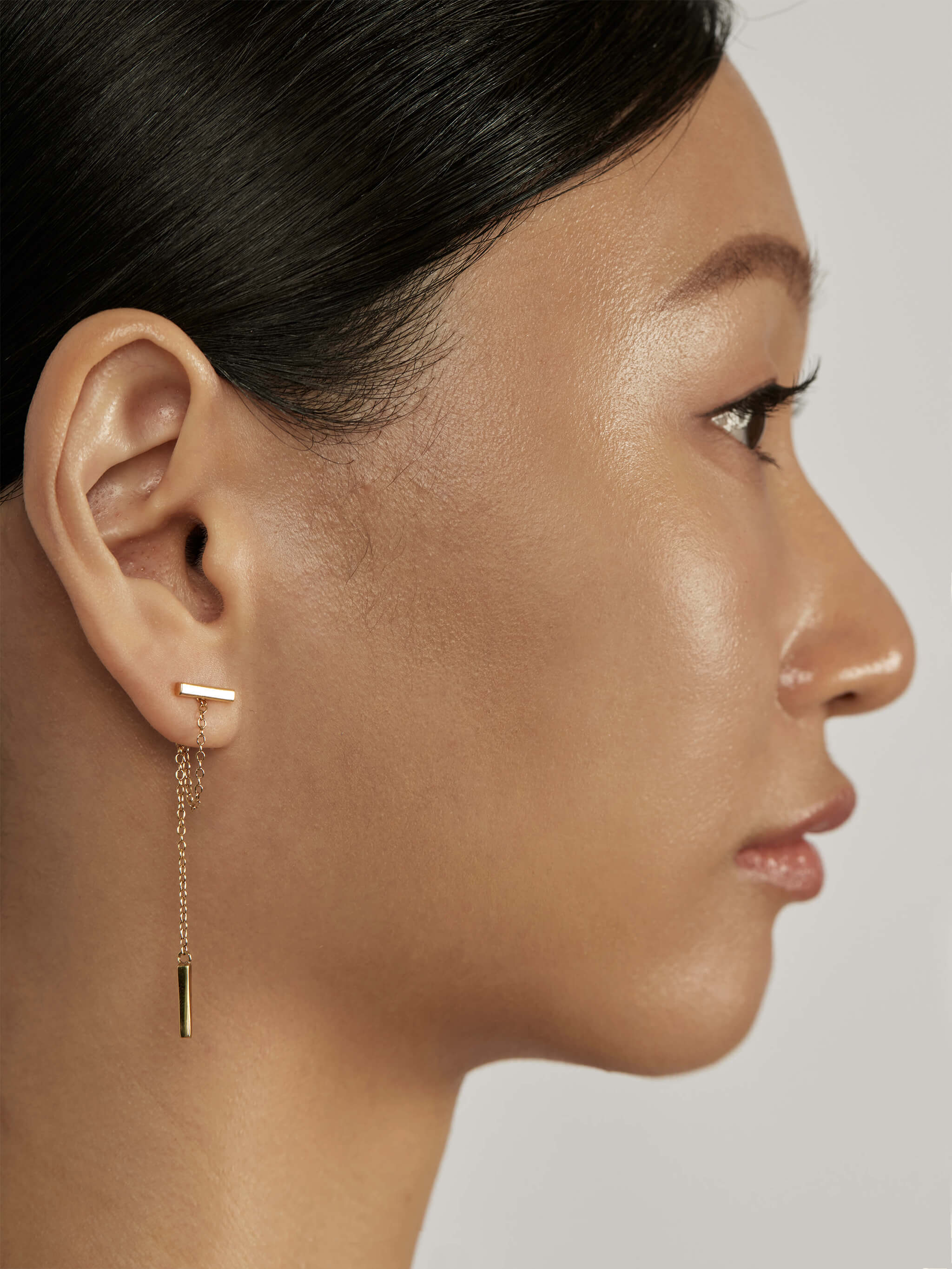 Classic Chain Ear Jacket Earrings styled in a layered ear stack