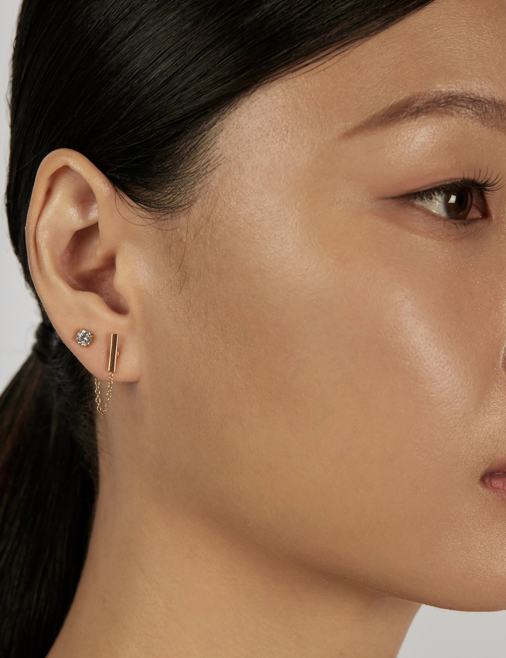 Classic Chain Ear Jacket Earrings styled in a minimal ear stack