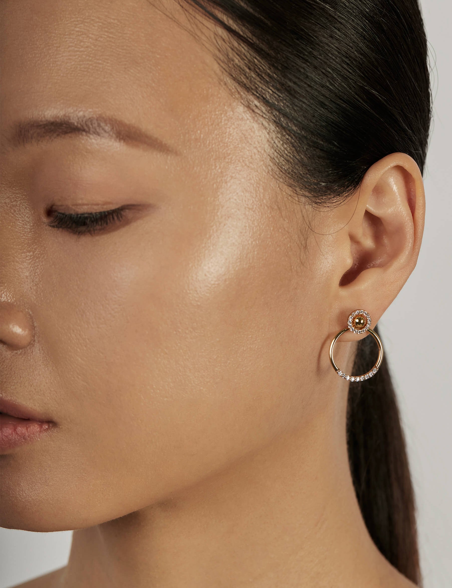 Halo Ear Jacket Earrings styled in a statement ear stack