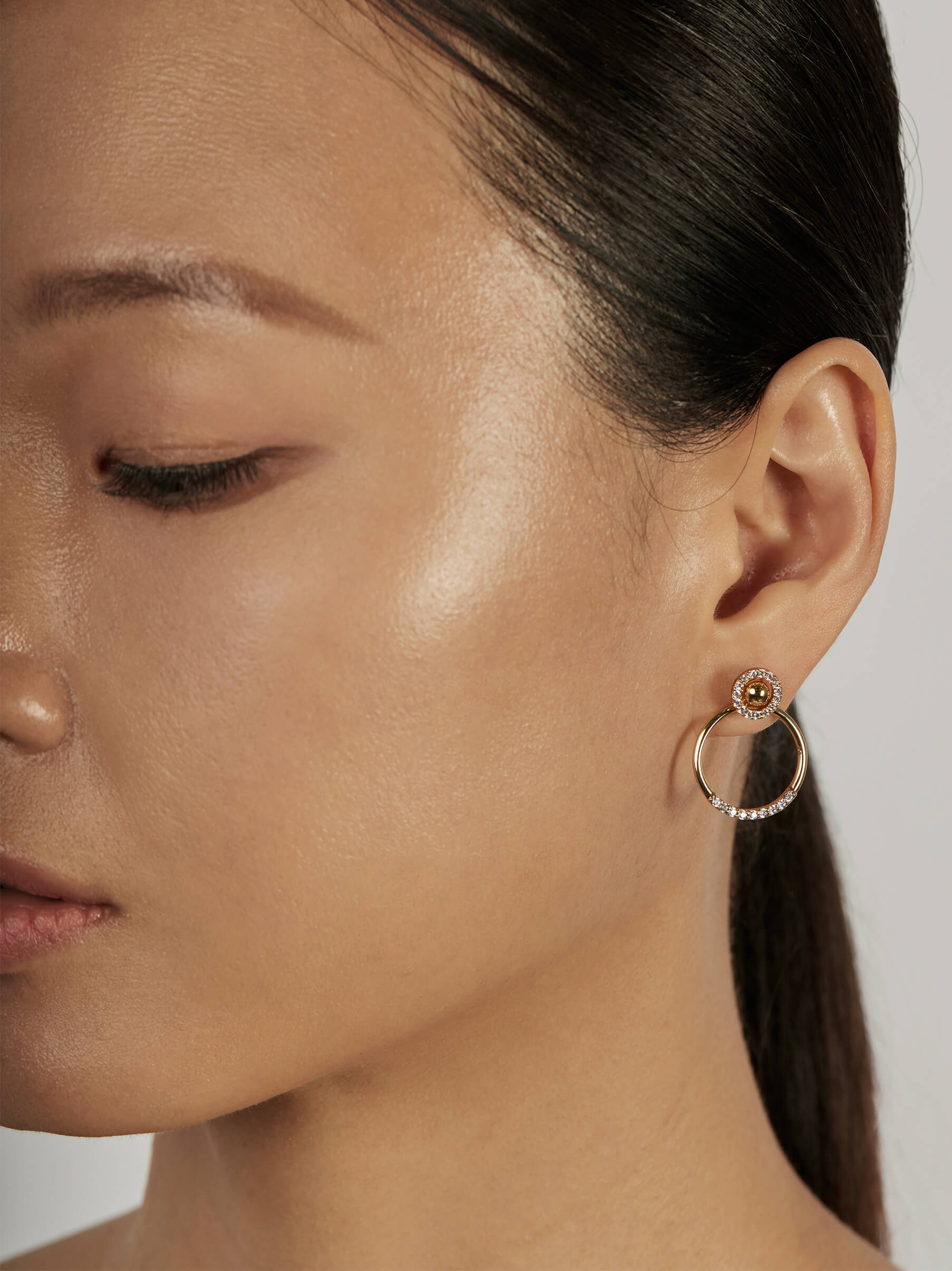 Halo Ear Jacket Earrings styled in a statement ear stack