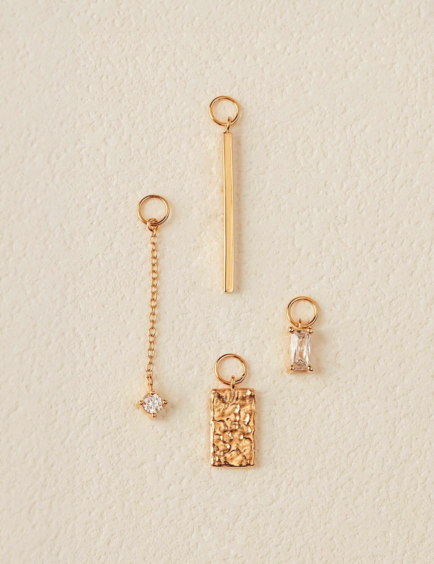 Huggie charms collection in gold vermeil