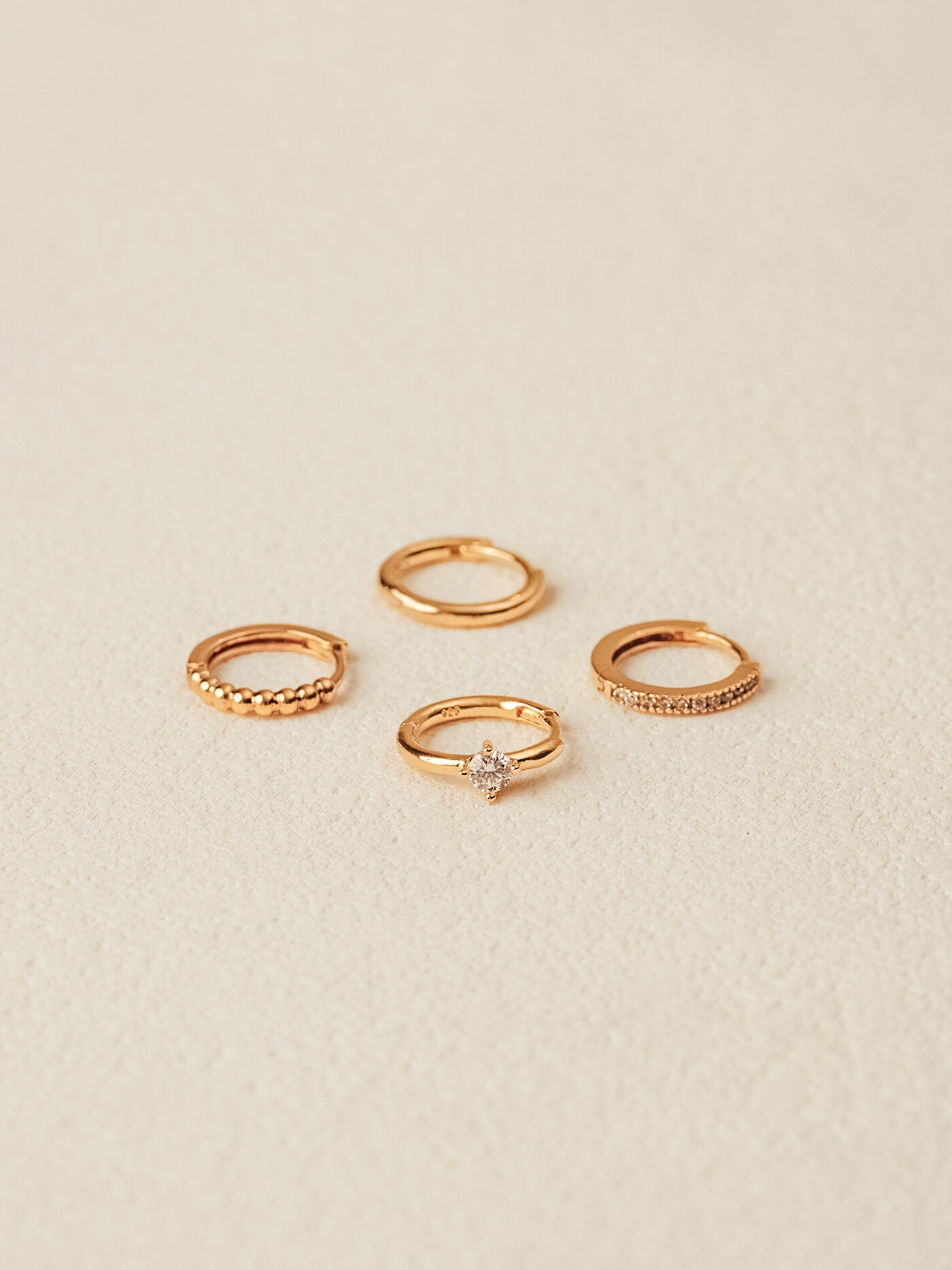 Huggie earrings collection in gold vermeil