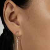 Pave Huggie Earrings with stacked charms closed-up view