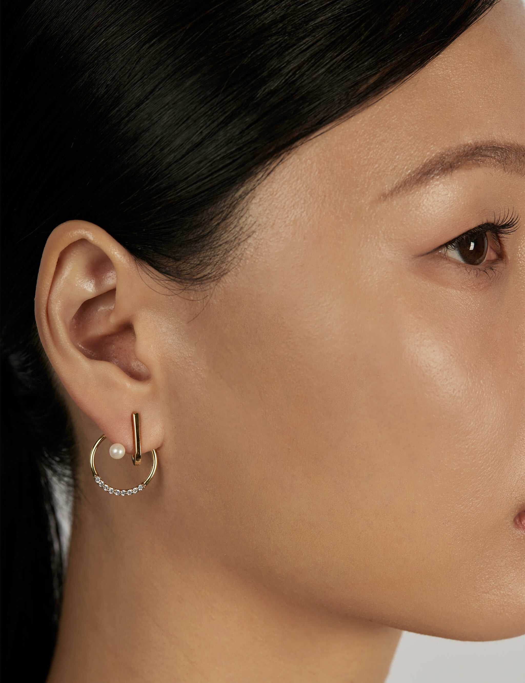 Pearl Drop Ear Jacket Earrings styled in a statement ear stack