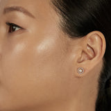 Pearl Stud Earrings styled in a minimal ear stack