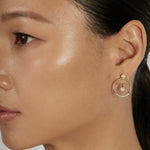 Pearl Stud Earrings styled in a statement ear stack
