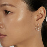 Pearl Stud Earrings styled in a statement ear stack