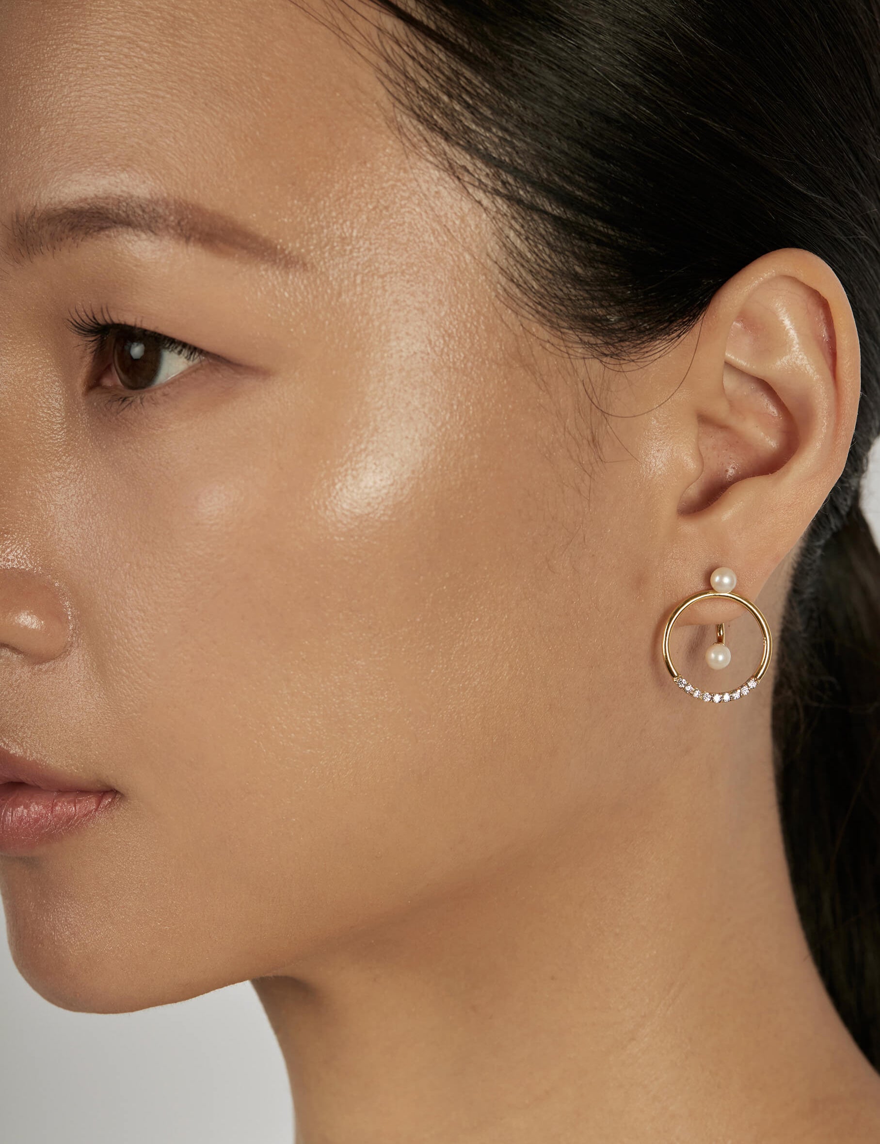 Pearl Stud Earrings styled in a statement ear stack