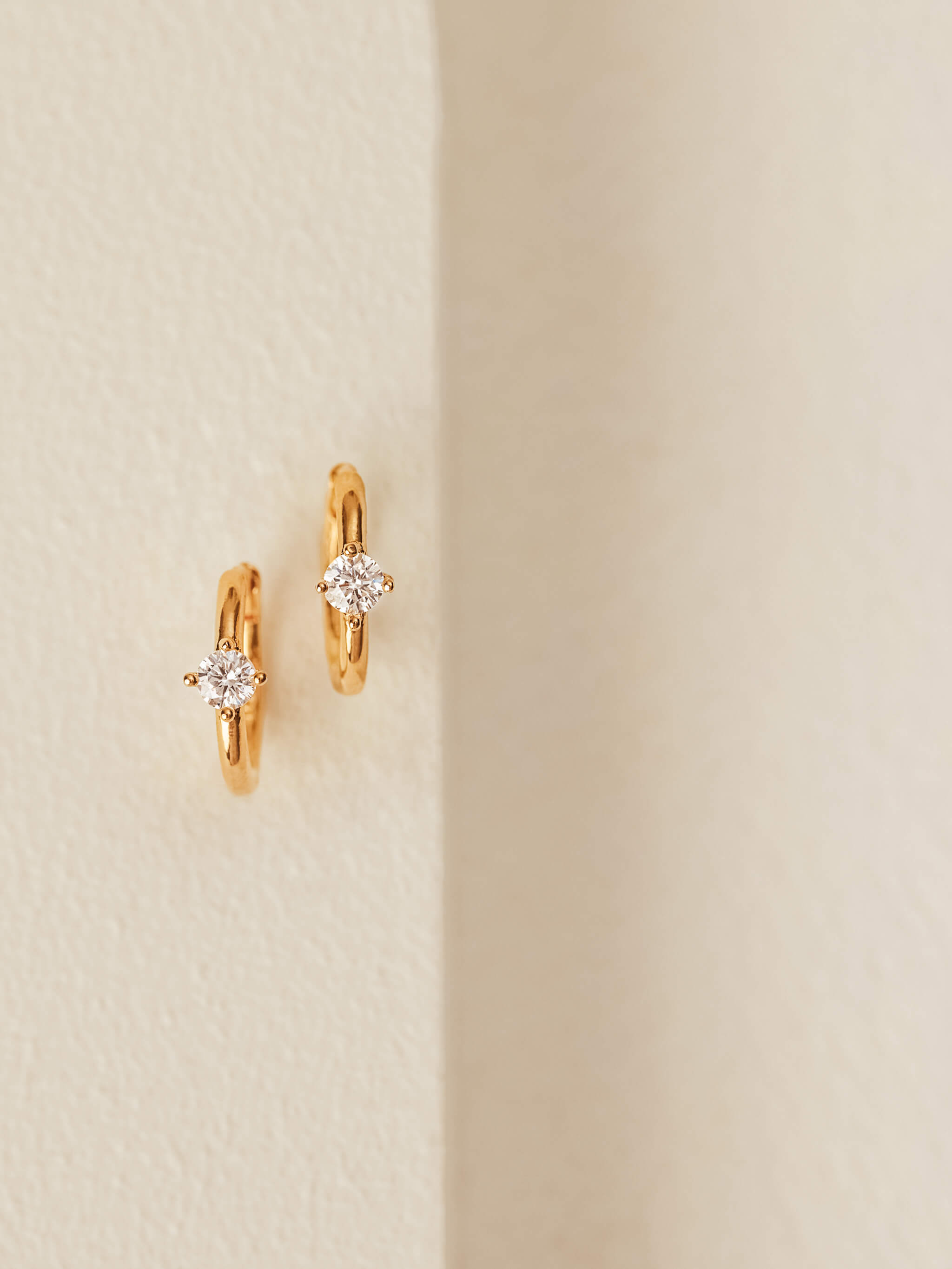 Solitaire Huggie Earrings in gold vermeil
