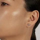 Solitaire Stud Earrings styled in a statement ear stack