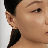 Sphere Drop Ear Jacket Earrings styled in a layered ear stack