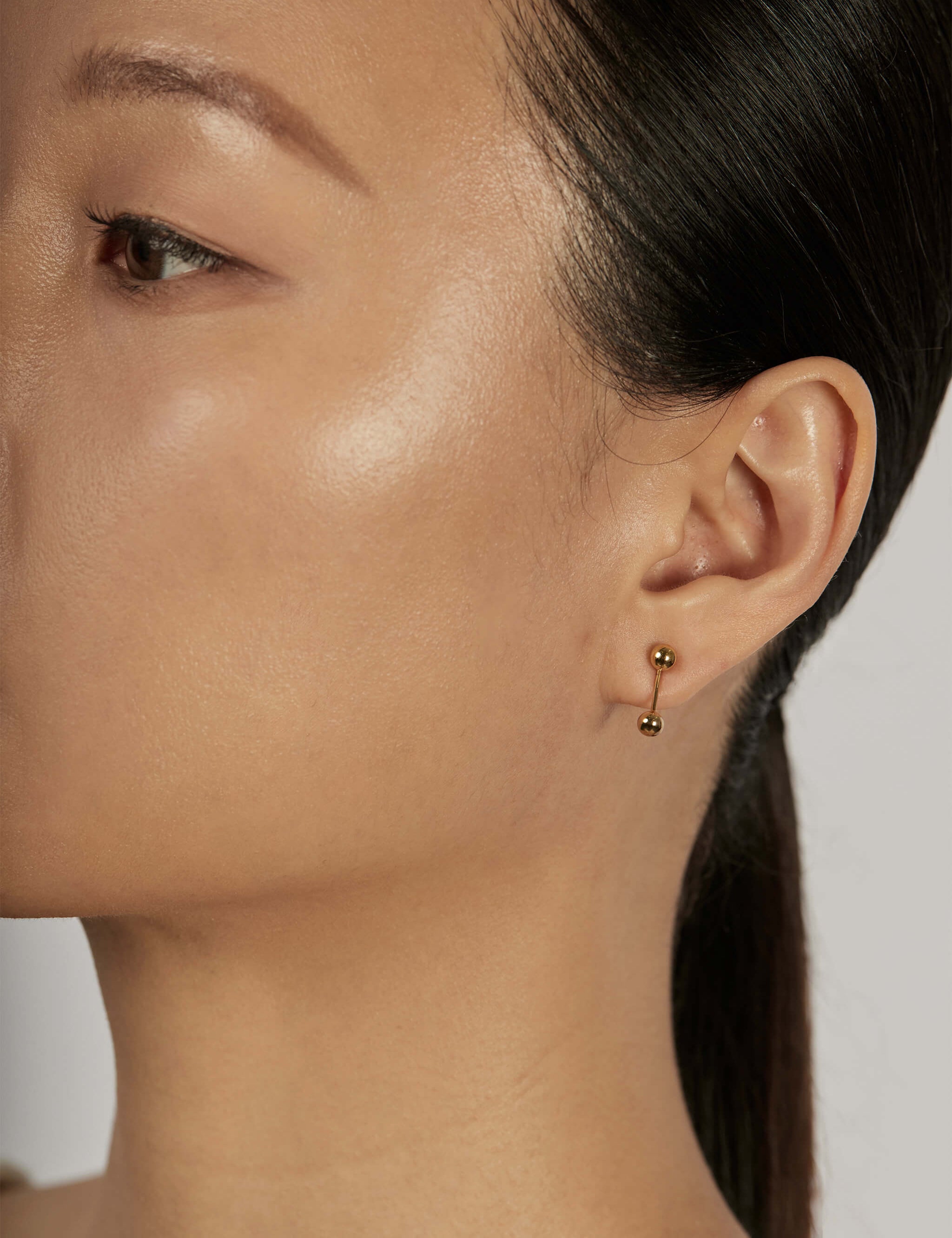 Sphere Drop Ear Jacket Earrings worn solo