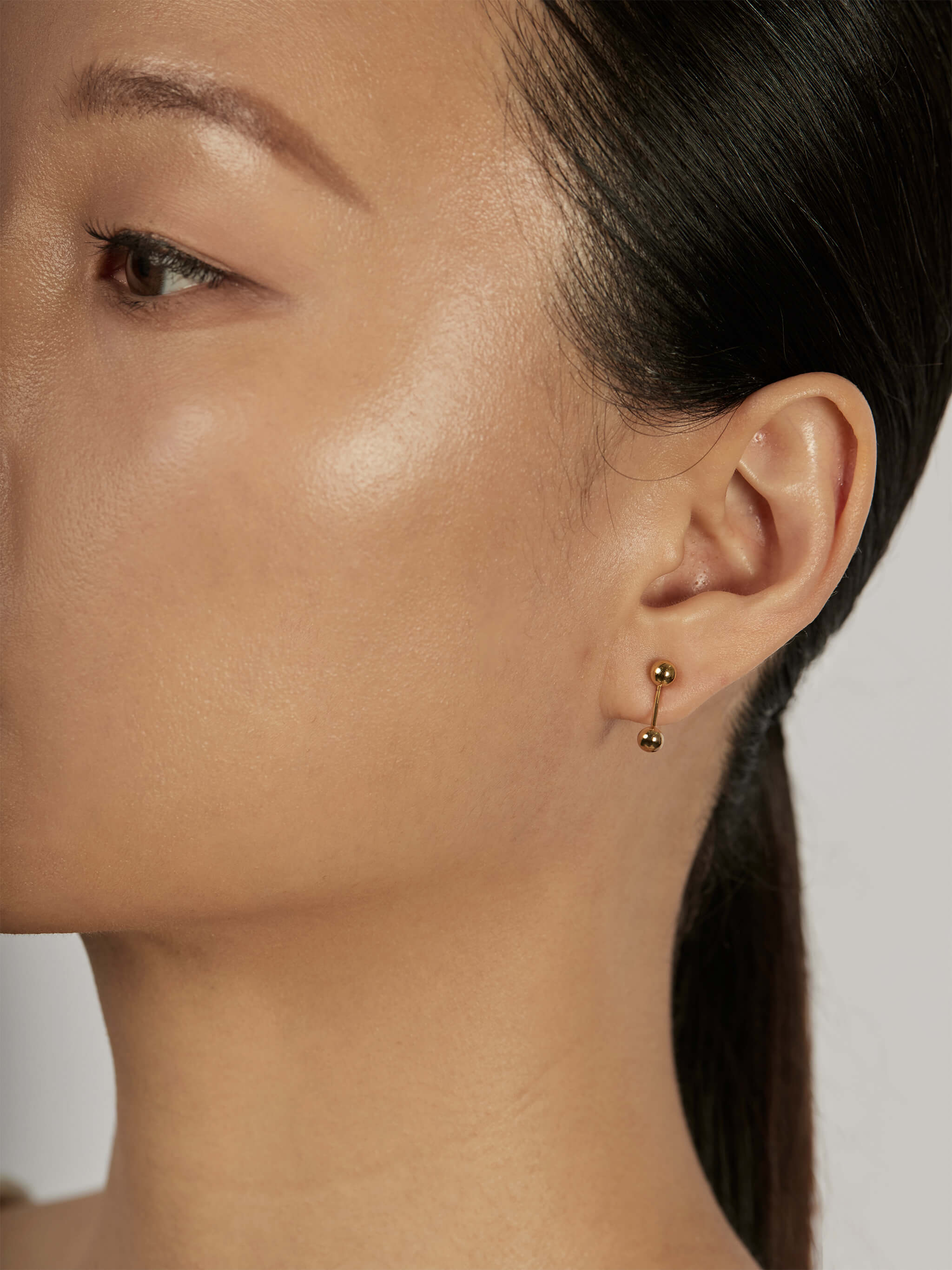 Sphere Drop Ear Jacket Earrings worn solo