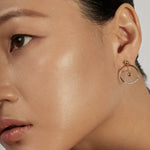 Sphere Drop Ear Jacket Earrings styled in a statement ear stack