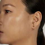 Sphere Drop Ear Jacket Earrings styled in a vertical look