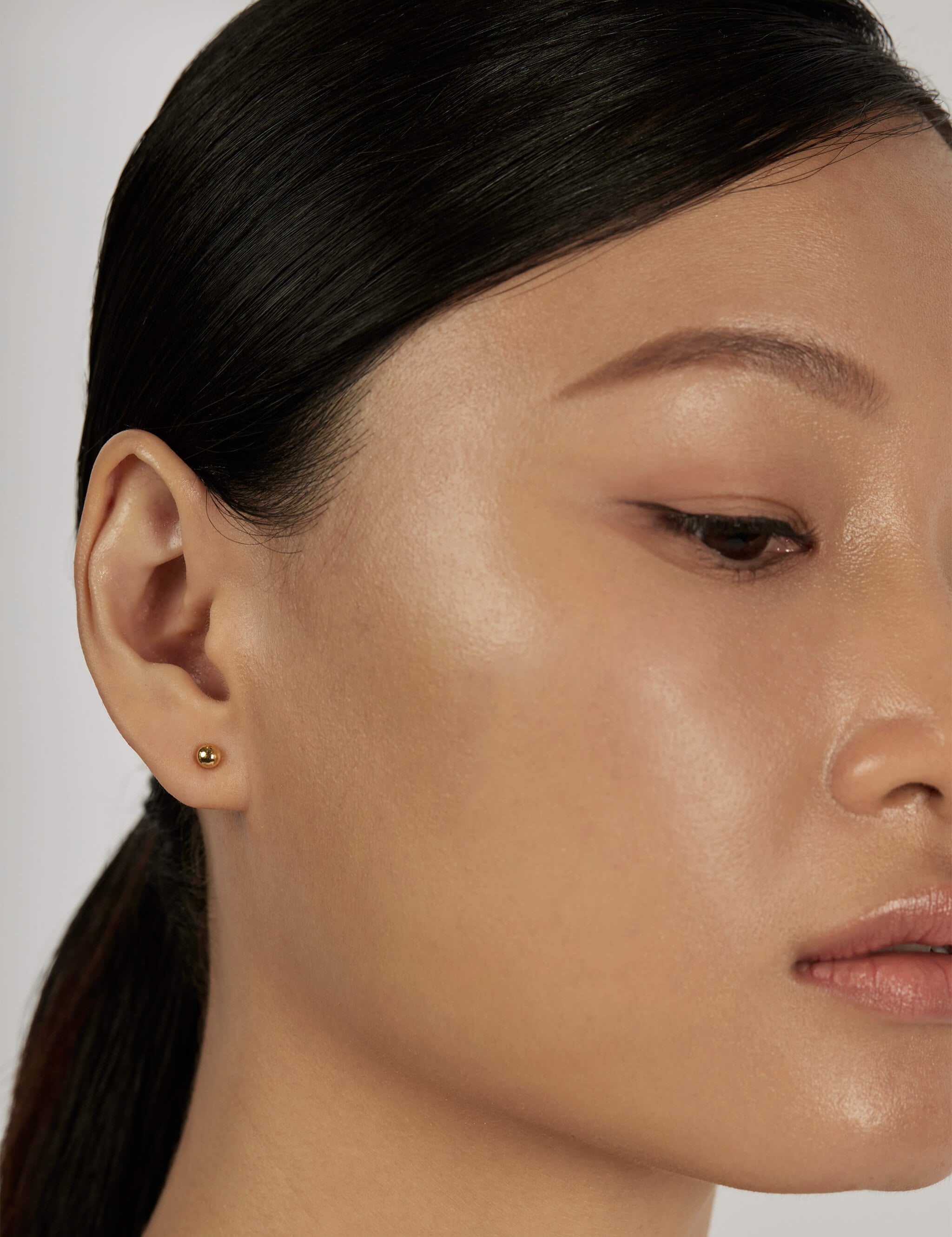 Sphere Stud Earrings worn solo
