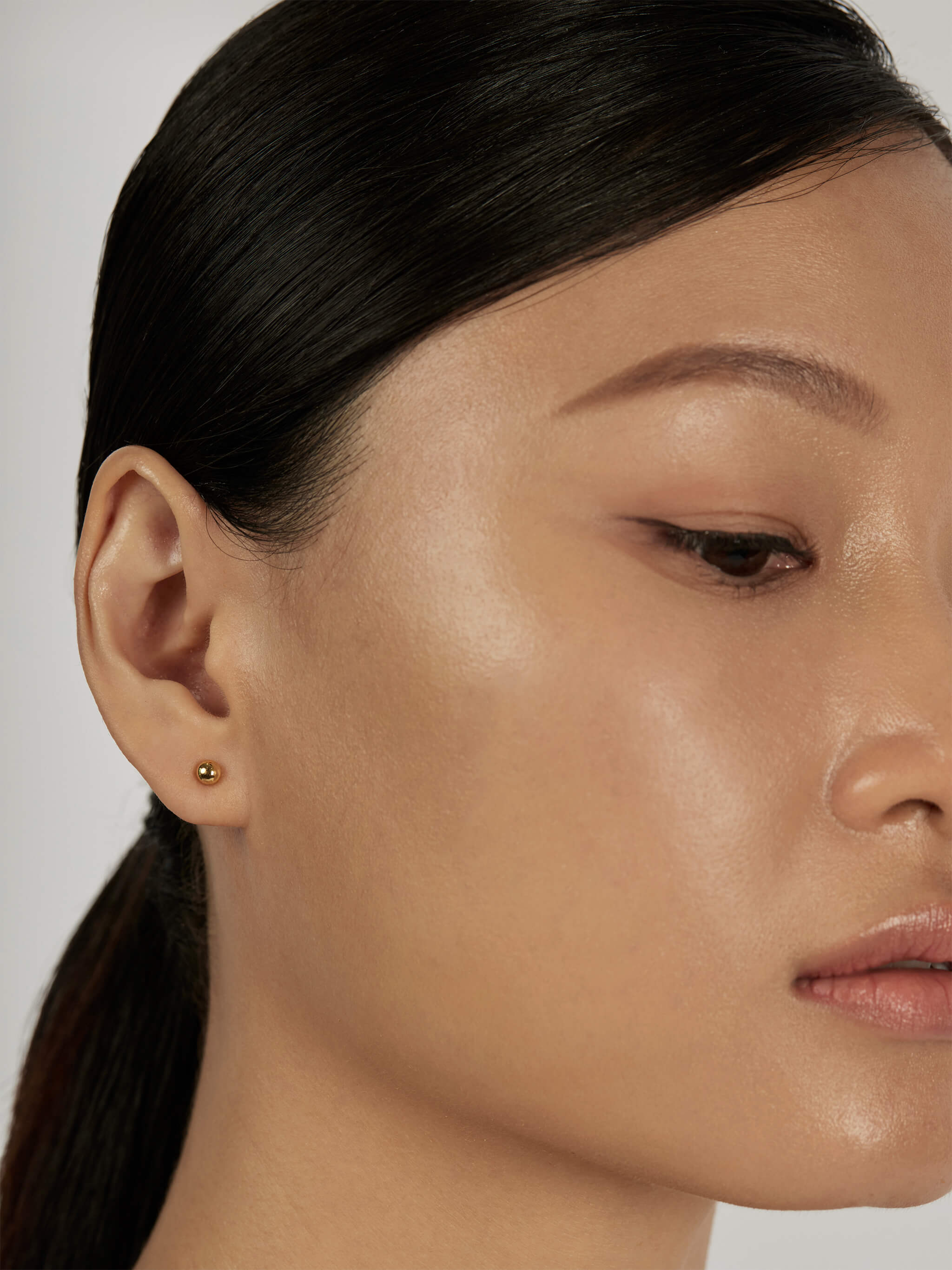 Sphere Stud Earrings worn solo