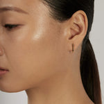 Suspend Bar Stud Earrings worn solo