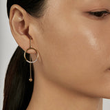 The Pendulum Earring Set styled in a statement ear stack