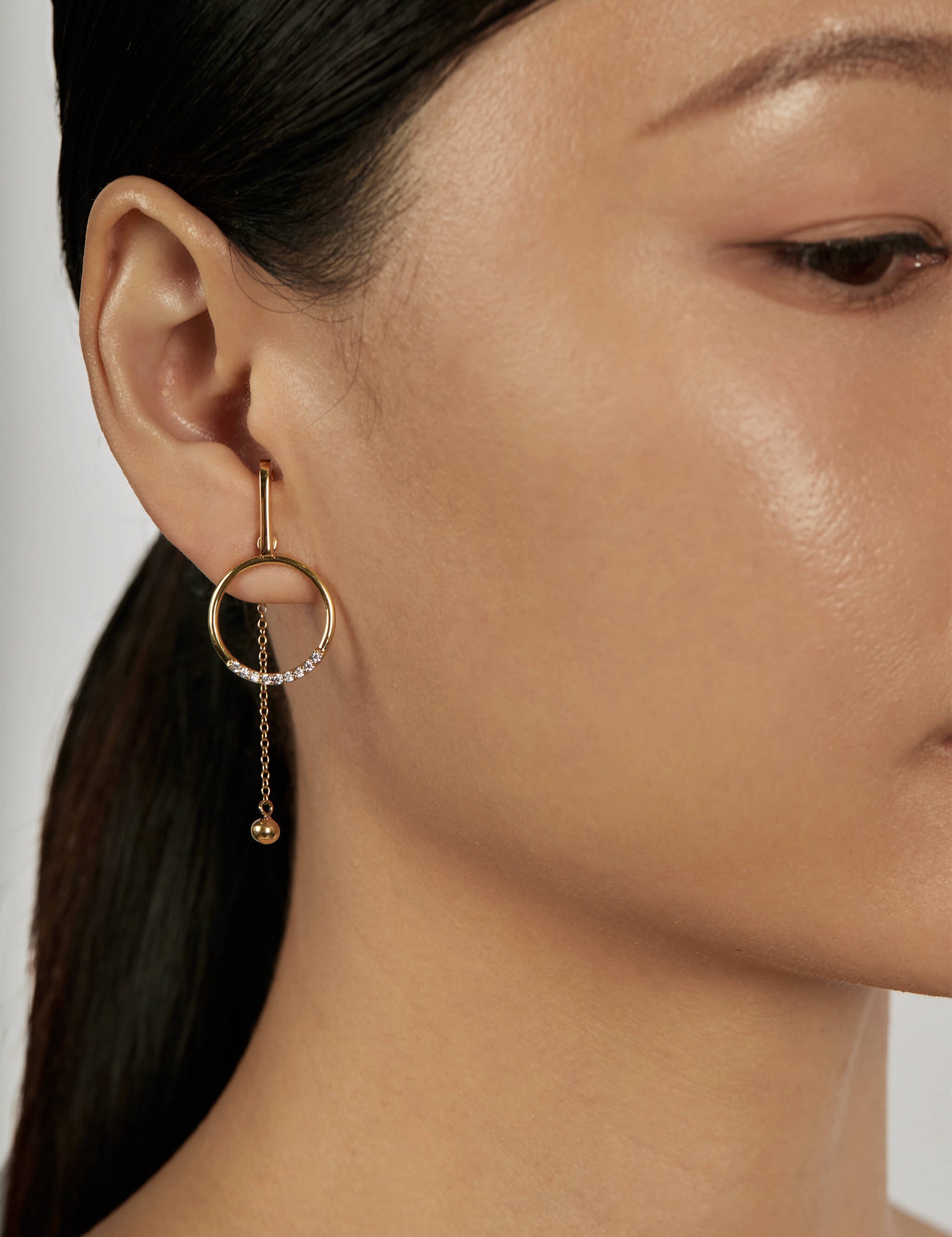 The Pendulum Earring Set styled in a statement ear stack