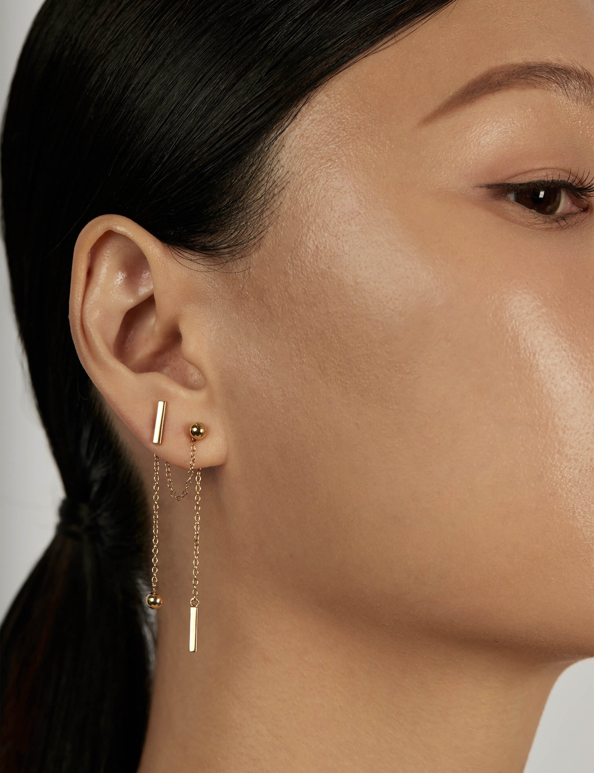 The Thread Earrings worn in a complete set
