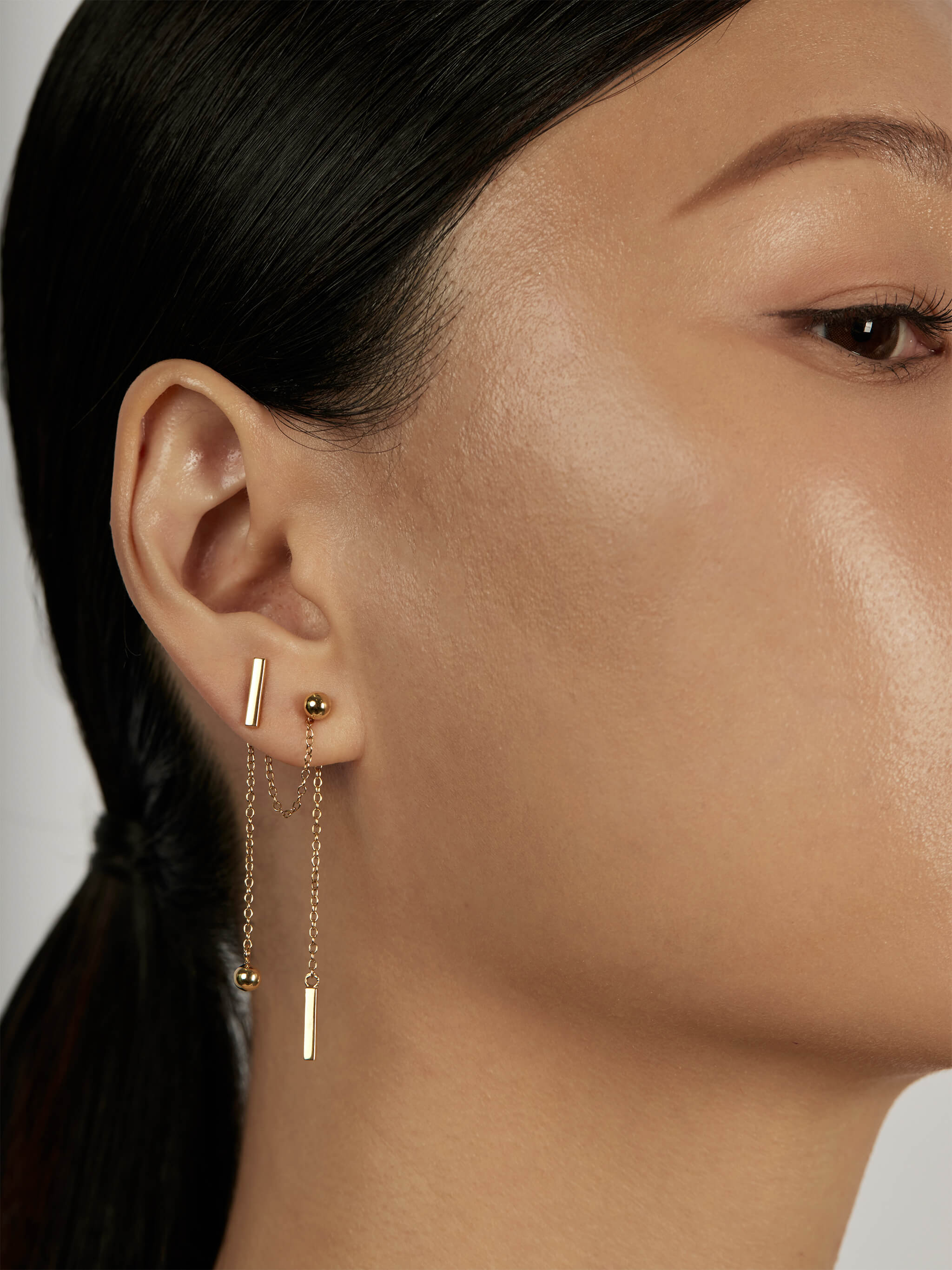 The Thread Earrings worn in a complete set