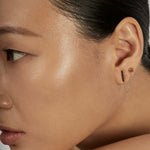 The Thread Earring Set styled in a layered ear stack