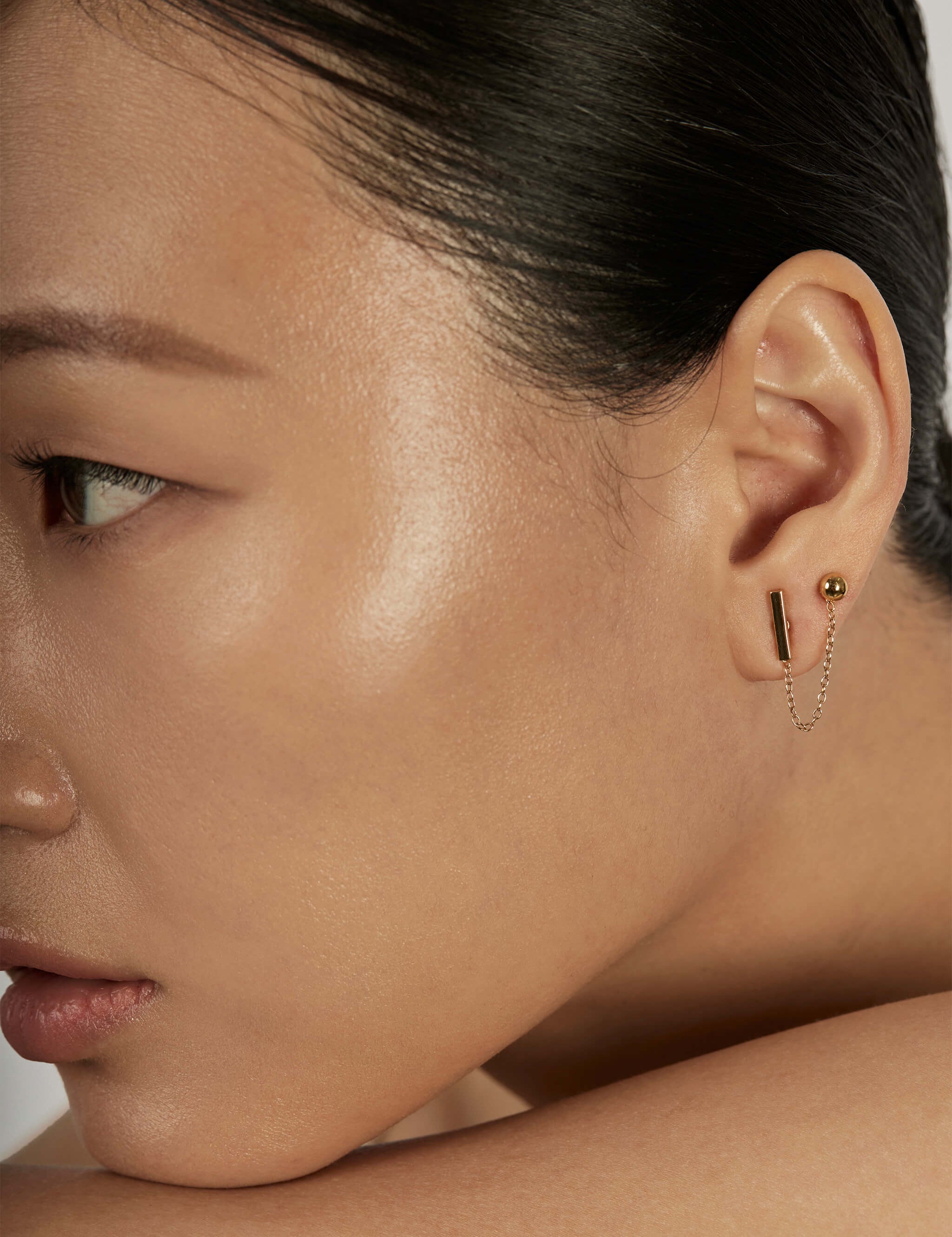 The Thread Earring Set styled in a layered ear stack