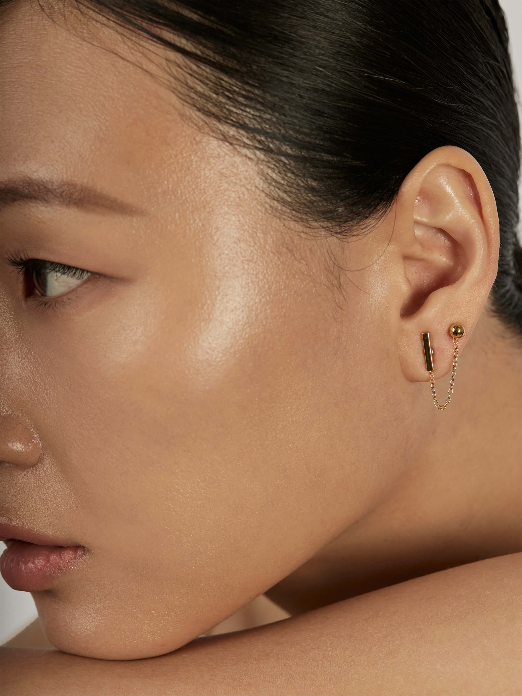 The Thread Earring Set styled in a layered ear stack